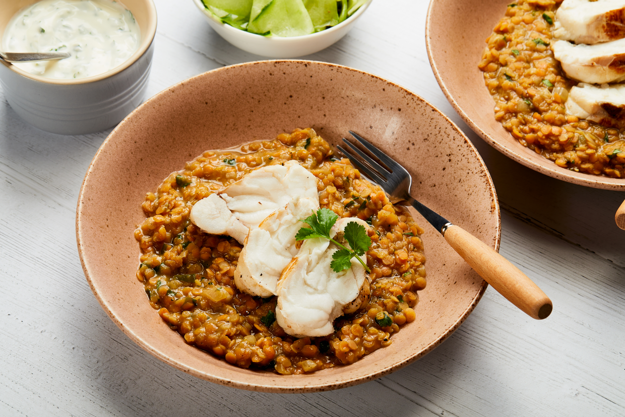 A photograph of Monkfish with spiced lentils